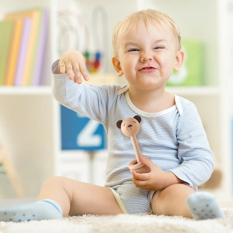 Explore our natural wood geometric rattle from Bubebaby BabyLove, designed for babies aged 0-36 months. CE-certified and crafted from high-quality wood, this unisex rattle features a variety of geometric shapes. Perfect for early sensory development and safe for all little ones