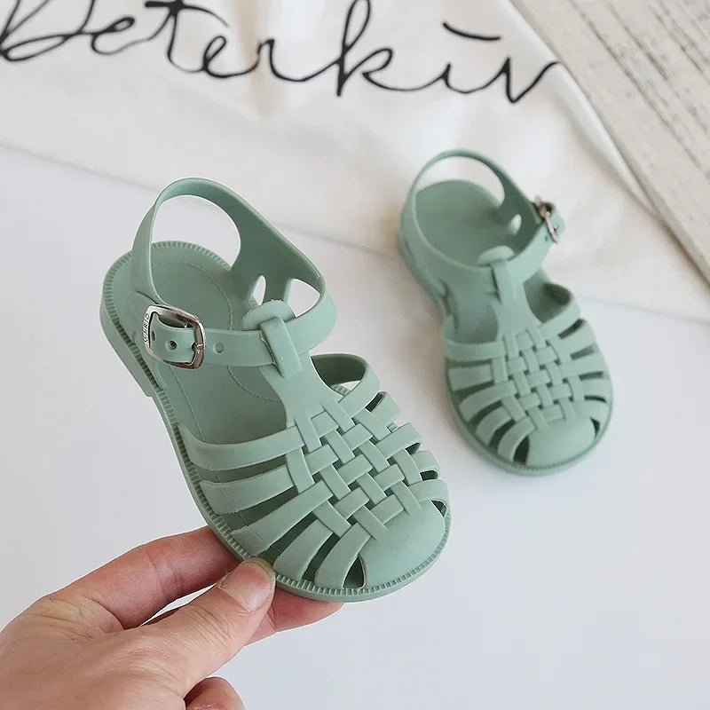 BabyLove Silicone Jelly Sandal at BubeBaby. These sandals feature a plastic outsole for durability and are designed with quick-dry, breathable, and anti-slippery features. Available in lengths of 10cm, 10.5cm, and 11cm, perfect for active little feet. Shop now for comfort and style