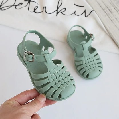 BabyLove Silicone Jelly Sandal at BubeBaby. These sandals feature a plastic outsole for durability and are designed with quick-dry, breathable, and anti-slippery features. Available in lengths of 10cm, 10.5cm, and 11cm, perfect for active little feet. Shop now for comfort and style