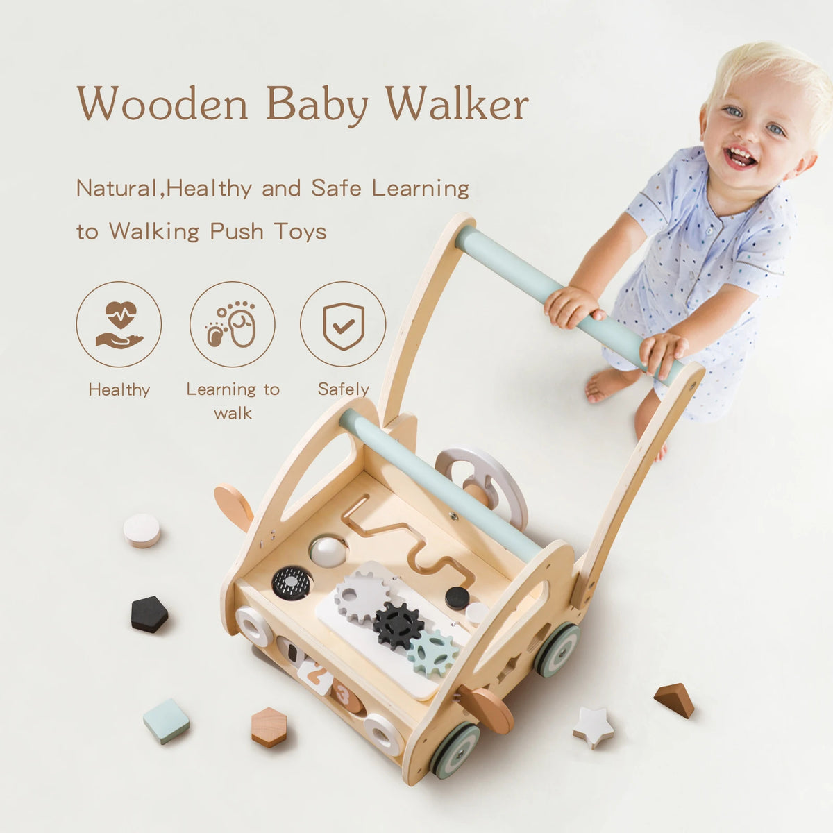 Toddler standing and holding the handle of the wooden push walker