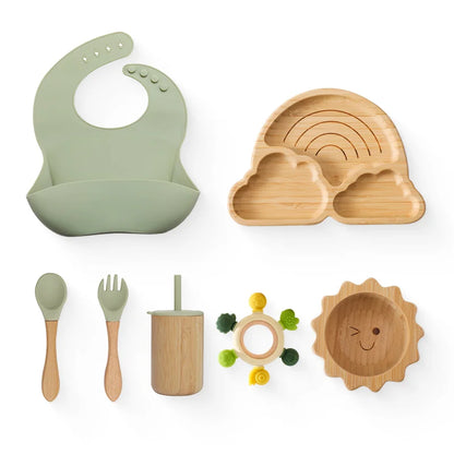 Eco-friendly Bubebaby Babylove 6-piece/7-piece Bamboo and Silicone Dinnerware Set for babies aged 6 months to 6 years. Made from BPA-free silicone and bamboo wood, this set includes a bowl, plate, fork, spoon, and teething toys, providing a safe and healthy mealtime experience. Certified by CE, EU, CIQ, and other standards for safety and quality