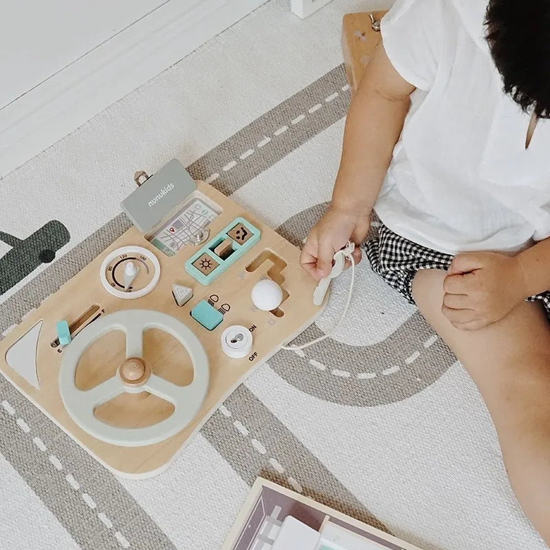 Explore the Bubebaby Wooden Montessori Car Driving Simulator, designed for ages 0-14+. This engaging toy features realistic car simulations and scene modeling, crafted to be smooth, wear-resistant, and safe for little hands. CE certified and perfect for enhancing playtime with a transportation theme