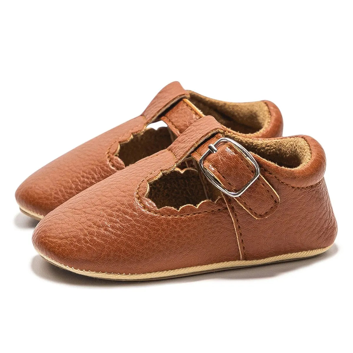 Bubebaby BabyLove faux leather dress shoes in a classic look. The shoes feature a sleek, polished design perfect for special occasions or formal wear. With a soft, cushioned interior for comfort