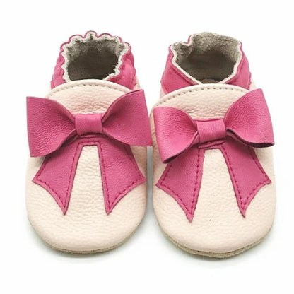 Bubebaby BabyLove Cow Leather First Walker Booties, featuring a classic design with a comfortable fit for early walkers. The booties are equipped with a flexible sole to support baby’s first steps. They come in a versatile colors, making them a stylish and practical choice for little ones