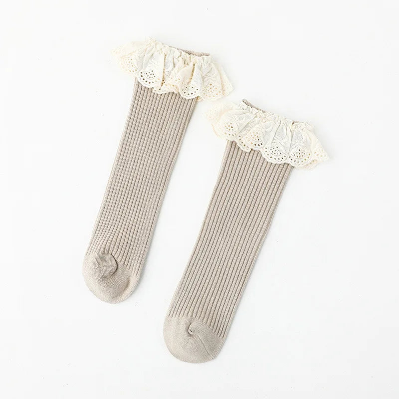 Bubebaby Babylove socks, perfect for all occasions. Made from cotton and polyester, these breathable comfortable, and skin-friendly socks are made with a solid pastoral style  featuring a ruffled frill finish