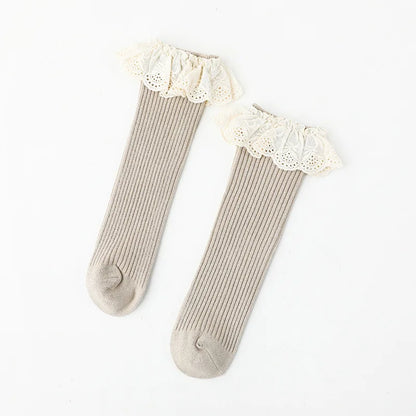 Bubebaby Babylove socks, perfect for all occasions. Made from cotton and polyester, these breathable comfortable, and skin-friendly socks are made with a solid pastoral style  featuring a ruffled frill finish
