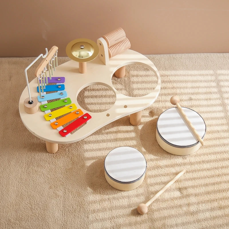 Discover the Bubebaby Montessori Music Table, an educational and non-electric musical instrument designed for children ages 0-14+. This table features engaging musical elements. Lightweight at 1.23kg and measuring 41.2X24.7X9.5cm, it's perfect for young learners seeking fun and educational play
