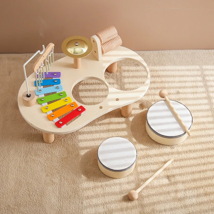 Discover the Bubebaby Montessori Music Table, an educational and non-electric musical instrument designed for children ages 0-14+. This table features engaging musical elements. Lightweight at 1.23kg and measuring 41.2X24.7X9.5cm, it's perfect for young learners seeking fun and educational play