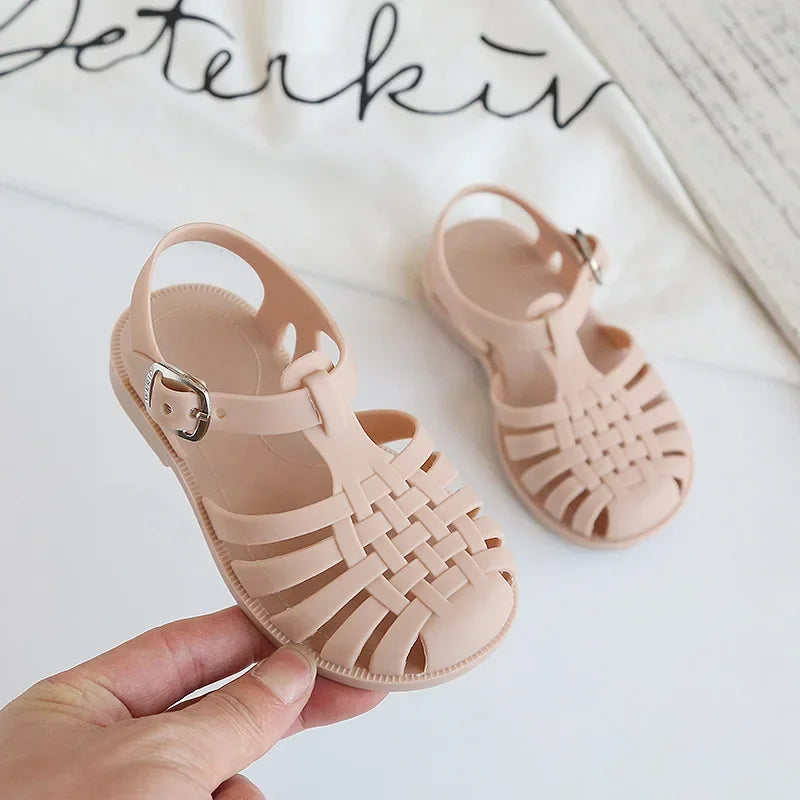 BabyLove Silicone Jelly Sandal at BubeBaby. These sandals feature a plastic outsole for durability and are designed with quick-dry, breathable, and anti-slippery features. Available in lengths of 10cm, 10.5cm, and 11cm, perfect for active little feet. Shop now for comfort and style