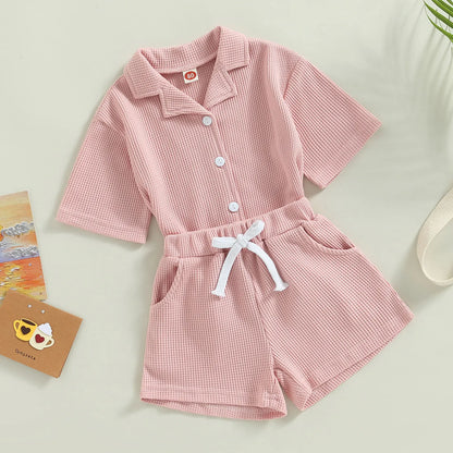 Shop our Bubebaby BabyLove summer baby unisex sets made from cotton and polyester, featuring a V-neck, single-breasted closure, and short sleeves. Available for ages 0-4 years with sizes ranging from 80-120 cm. The set includes a top and shorts with a cute print pattern, fitting true to size. Ideal for warm weather, these sets ensure comfort and style for your little ones.