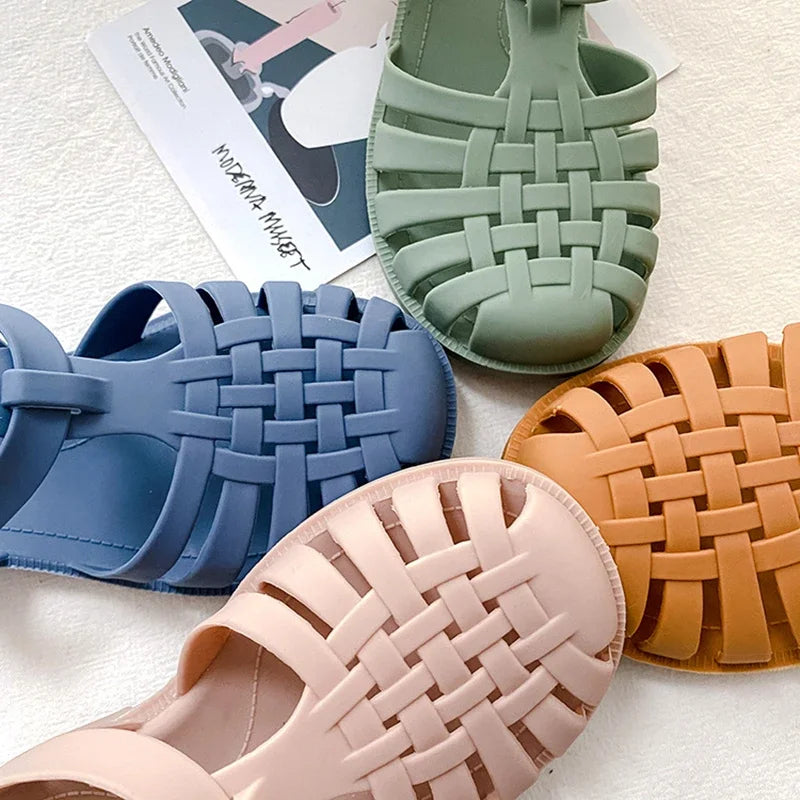 BabyLove Silicone Jelly Sandal at BubeBaby. These sandals feature a plastic outsole for durability and are designed with quick-dry, breathable, and anti-slippery features. Available in lengths of 10cm, 10.5cm, and 11cm, perfect for active little feet. Shop now for comfort and style