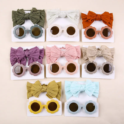 Unisex babylove headband and sunglasses set made of high-quality nylon and plastic. Suitable for ages 0-6 years, featuring solid patterns. Includes a nylon headband (16cm x 8cm) and plastic sunglasses (13cm x 5cm). Perfect for all seasons and occasions, both indoors and outdoors