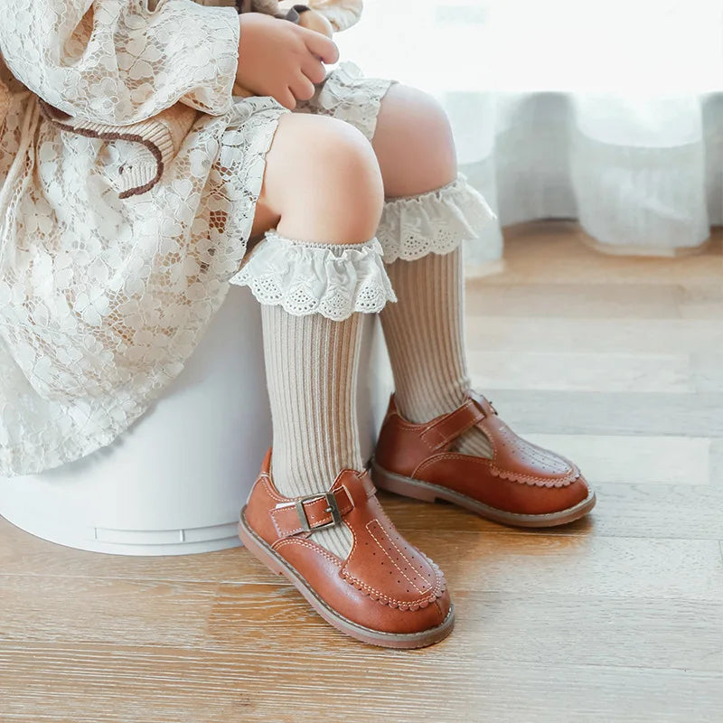 Bubebaby Babylove socks, perfect for all occasions. Made from cotton and polyester, these breathable comfortable, and skin-friendly socks are made with a solid pastoral style  featuring a ruffled frill finish