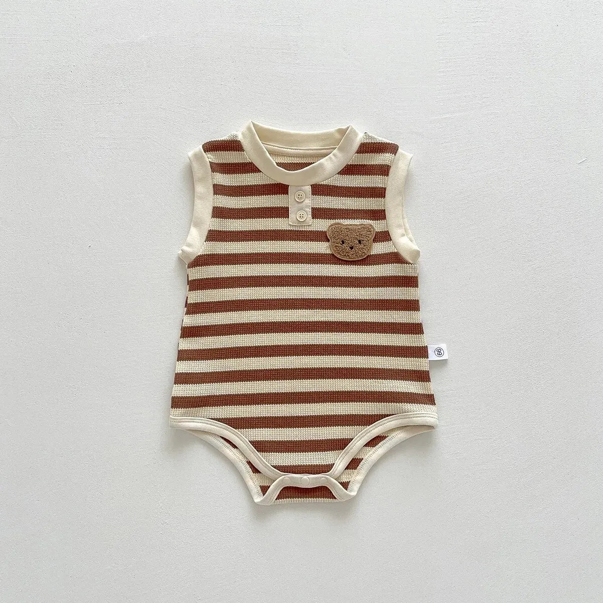 Keep your baby stylish and comfy with our BabyLove Striped Summer Sleeveless Romper From Bubebaby. Made from 95% cotton, this pullover romper features a breathable, sleeveless design perfect for hot days. Available in sizes for 0-24 months, it's ideal for keeping little ones cool and free to explore. Shop now for the perfect summer outfit