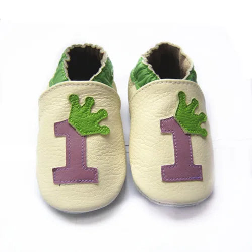 Bubebaby BabyLove Cow Leather First Walker Booties, featuring a classic design with a comfortable fit for early walkers. The booties are equipped with a flexible sole to support baby’s first steps. They come in a versatile colors, making them a stylish and practical choice for little ones