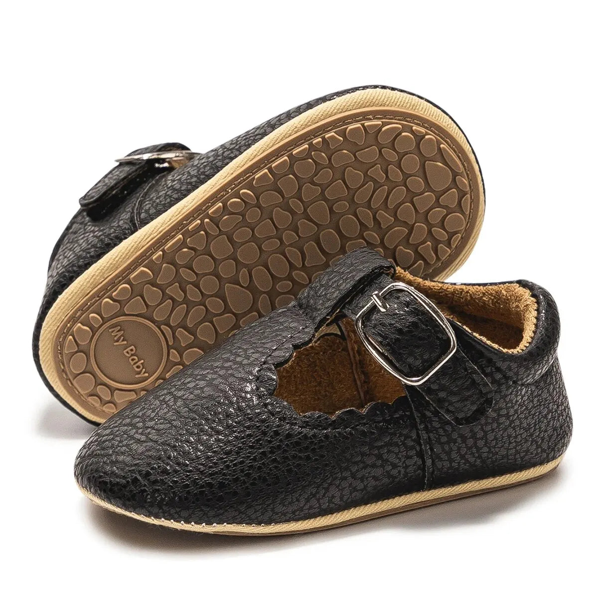 Bubebaby BabyLove faux leather dress shoes in a classic look. The shoes feature a sleek, polished design perfect for special occasions or formal wear. With a soft, cushioned interior for comfort