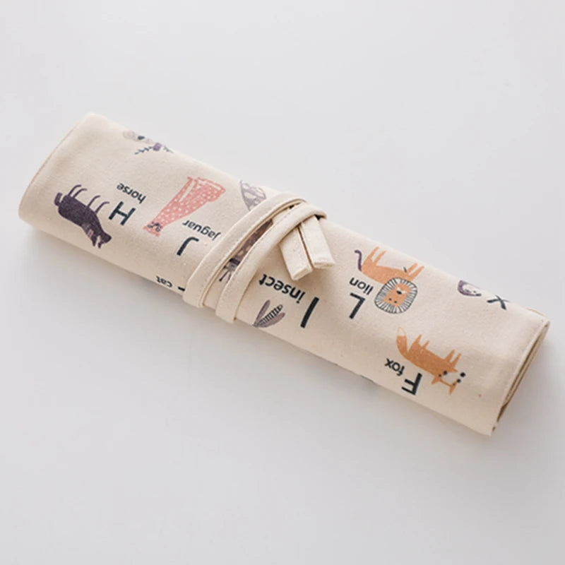 ABC canvas bag rolled up and tied with its fabric strap for travel