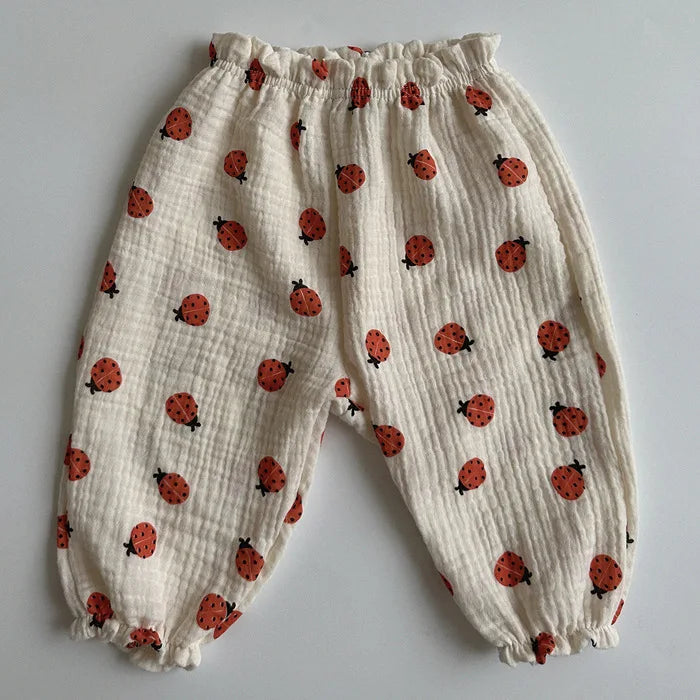 Soft muslin pants for babies from the BabyLove by Bubebaby collection. The pants are made of lightweight, breathable fabric with a gentle, stretchy waistband and a relaxed fit for comfort. The color is a soft, neutral tone, suitable for pairing with various baby tops