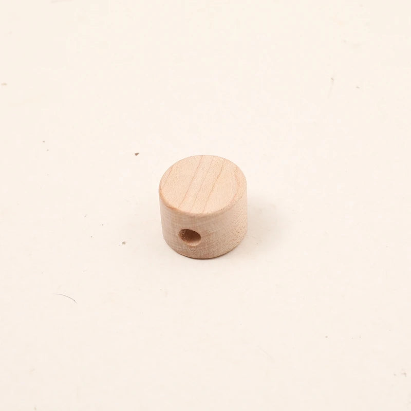 Beech wood cylinder shape with a threading hole