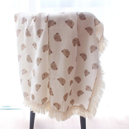 Nursery Muslin Throw Bears at BubeBaby. This unisex throw is made from soft, breathable cotton muslin, perfect for babies. Ideal for snuggling and keeping cozy, it’s designed for comfort and style. Shop now for a versatile, high-quality addition to your nursery essentials