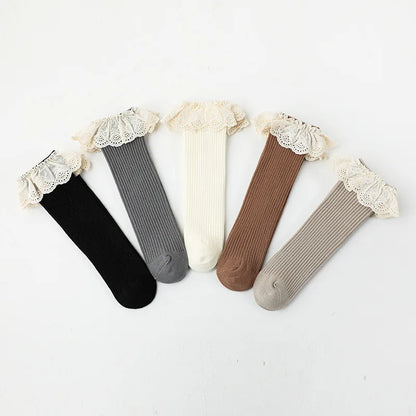 Bubebaby Babylove socks, perfect for all occasions. Made from cotton and polyester, these breathable comfortable, and skin-friendly socks are made with a solid pastoral style  featuring a ruffled frill finish