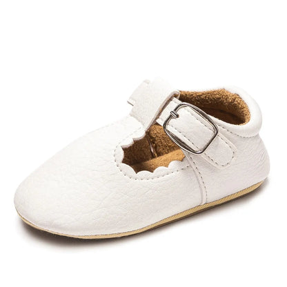 Bubebaby BabyLove faux leather dress shoes in a classic look. The shoes feature a sleek, polished design perfect for special occasions or formal wear. With a soft, cushioned interior for comfort