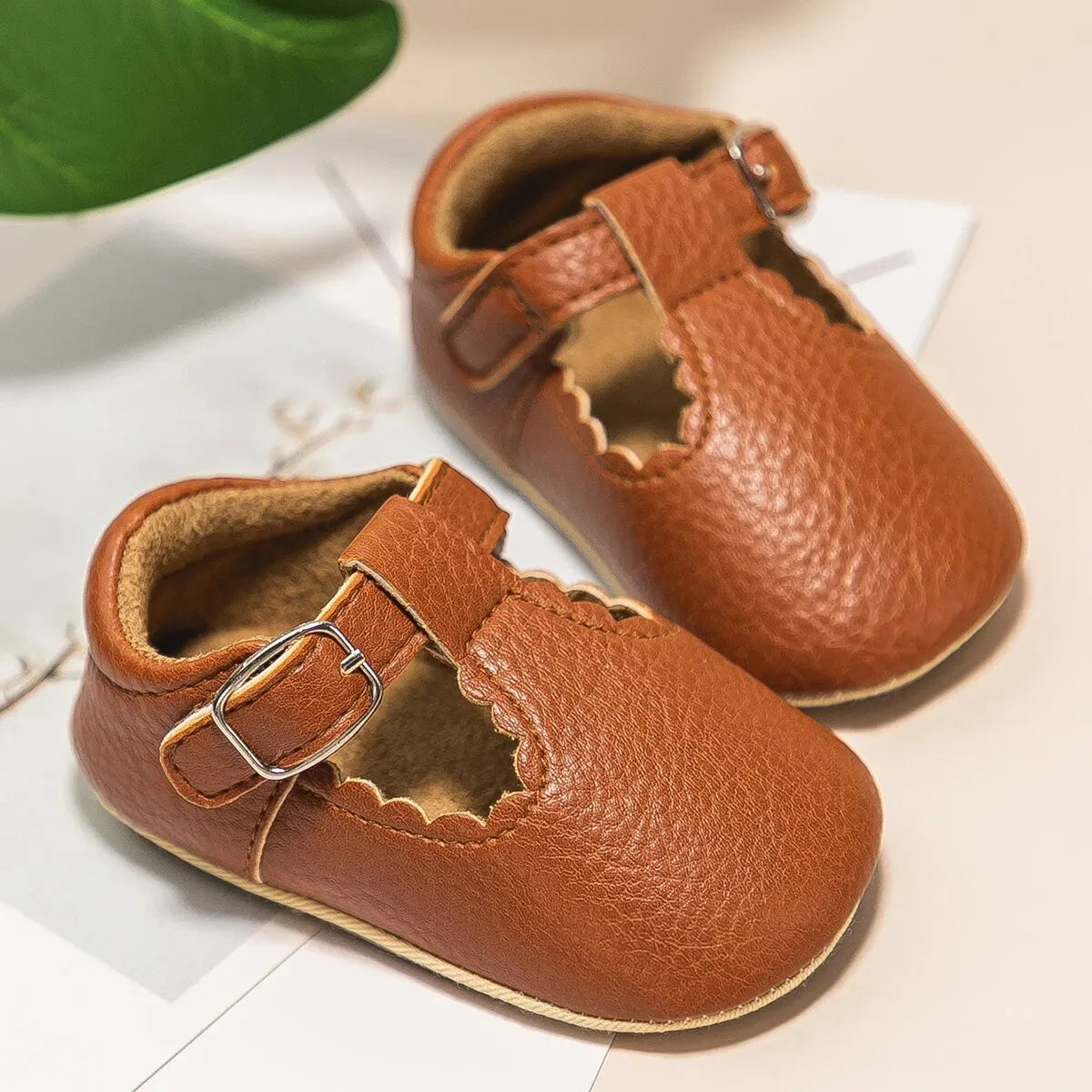 Bubebaby BabyLove faux leather dress shoes in a classic look. The shoes feature a sleek, polished design perfect for special occasions or formal wear. With a soft, cushioned interior for comfort