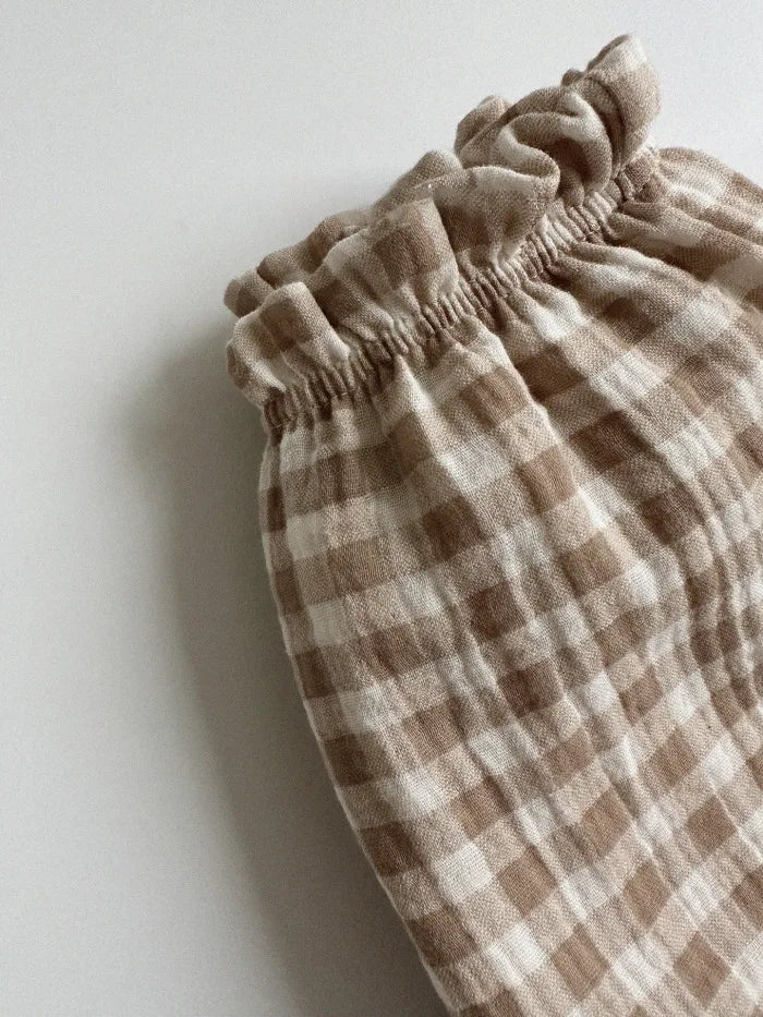 Soft muslin pants for babies from the BabyLove by Bubebaby collection. The pants are made of lightweight, breathable fabric with a gentle, stretchy waistband and a relaxed fit for comfort. The color is a soft, neutral tone, suitable for pairing with various baby tops