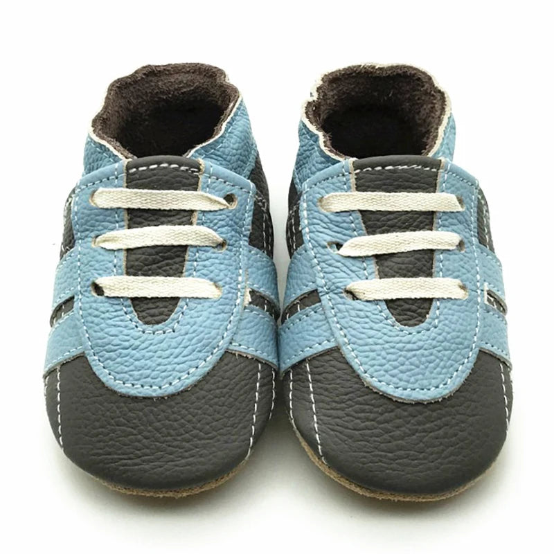 Bubebaby BabyLove Cow Leather First Walker Booties, featuring a classic design with a comfortable fit for early walkers. The booties are equipped with a flexible sole to support baby’s first steps. They come in a versatile colors, making them a stylish and practical choice for little ones