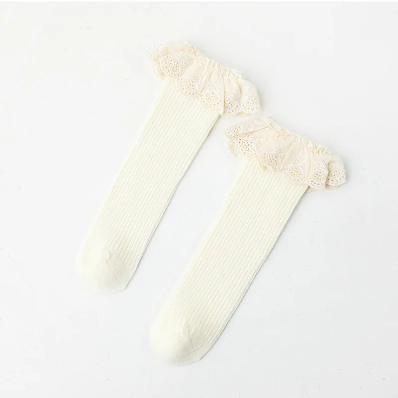 Bubebaby Babylove socks, perfect for all occasions. Made from cotton and polyester, these breathable comfortable, and skin-friendly socks are made with a solid pastoral style  featuring a ruffled frill finish