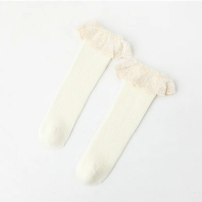 Bubebaby Babylove socks, perfect for all occasions. Made from cotton and polyester, these breathable comfortable, and skin-friendly socks are made with a solid pastoral style  featuring a ruffled frill finish