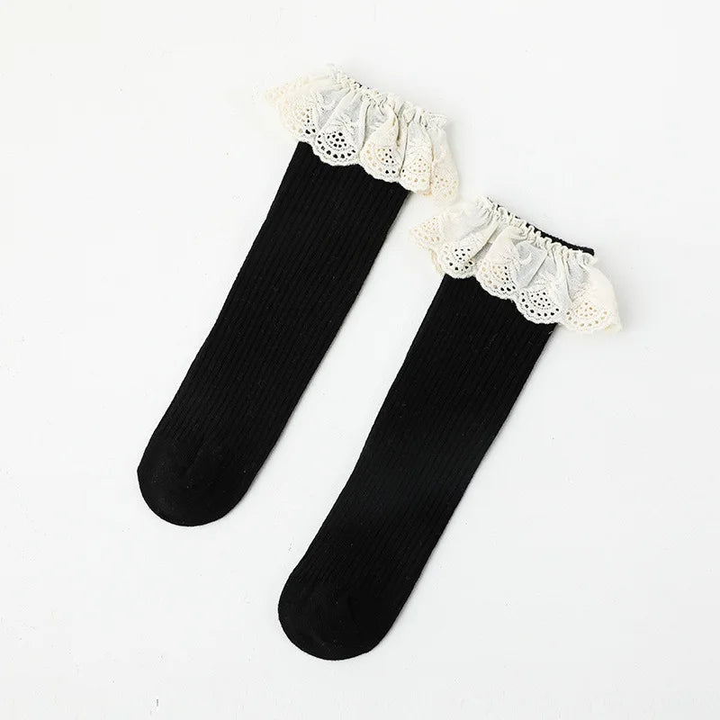 Bubebaby Babylove socks, perfect for all occasions. Made from cotton and polyester, these breathable comfortable, and skin-friendly socks are made with a solid pastoral style  featuring a ruffled frill finish