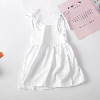 A BabyLove by Bubebaby light and breezy summer dress with spaghetti straps, designed for babies. The dress features a loose, relaxed fit and a soft, comfortable fabric, perfect for keeping little ones cool on warm days