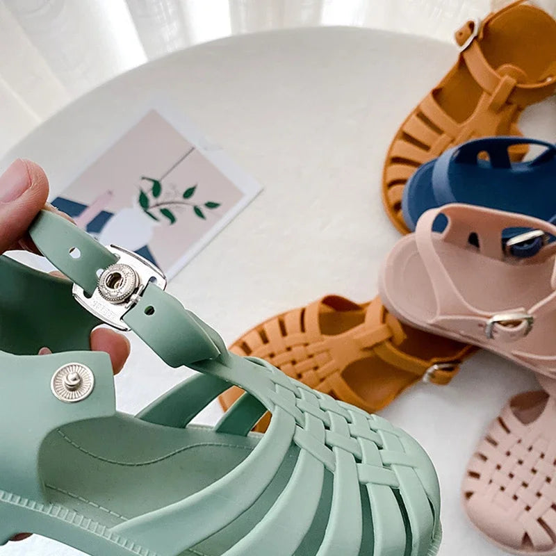 BabyLove Silicone Jelly Sandal at BubeBaby. These sandals feature a plastic outsole for durability and are designed with quick-dry, breathable, and anti-slippery features. Available in lengths of 10cm, 10.5cm, and 11cm, perfect for active little feet. Shop now for comfort and style