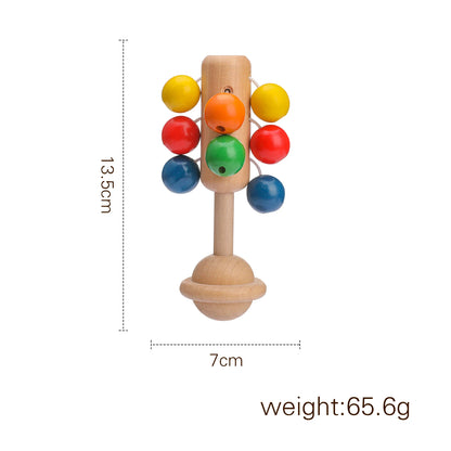 Discover the Bubebaby BabyLove Montessori Wooden Rattle, crafted from high-quality wood for unisex use. For ages 7-24 months, it features engaging cartoon shapes and musical elements. CE certified for safety, it measures 15 x 7.2 cm and weighs 60g.