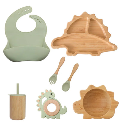 Eco-friendly Bubebaby Babylove 6-piece/7-piece Bamboo and Silicone Dinnerware Set for babies aged 6 months to 6 years. Made from BPA-free silicone and bamboo wood, this set includes a bowl, plate, fork, spoon, and teething toys, providing a safe and healthy mealtime experience. Certified by CE, EU, CIQ, and other standards for safety and quality