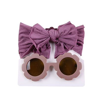 Unisex babylove headband and sunglasses set made of high-quality nylon and plastic. Suitable for ages 0-6 years, featuring solid patterns. Includes a nylon headband (16cm x 8cm) and plastic sunglasses (13cm x 5cm). Perfect for all seasons and occasions, both indoors and outdoors