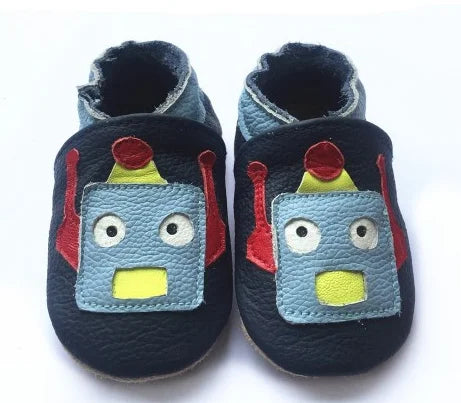 Bubebaby BabyLove Cow Leather First Walker Booties, featuring a classic design with a comfortable fit for early walkers. The booties are equipped with a flexible sole to support baby’s first steps. They come in a versatile colors, making them a stylish and practical choice for little ones