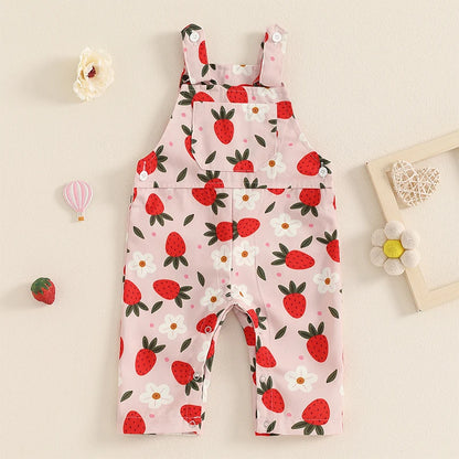 Bubebaby BabyLove Floral Jumpsuit Dungaree Romper. The romper features a floral pattern with a mix of vibrant colors. Featuring a pocket on the chest with shoulder straps, and snap closures at the bottom for easy diaper changes.