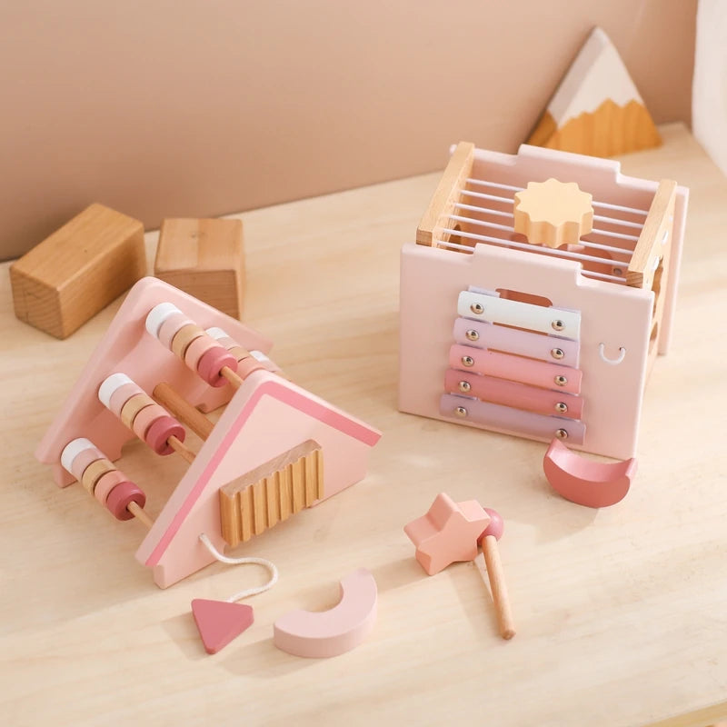 Explore our BabyLove Europe-certified (CE) Montessori Wooden Toys for children aged 3-6 years at Bubebaby. This multifunctional, five-in-one educational toy is designed to enhance hand-eye coordination, fine motor skills, logical thinking, and spatial imagination. Available for both direct sales and wholesale.