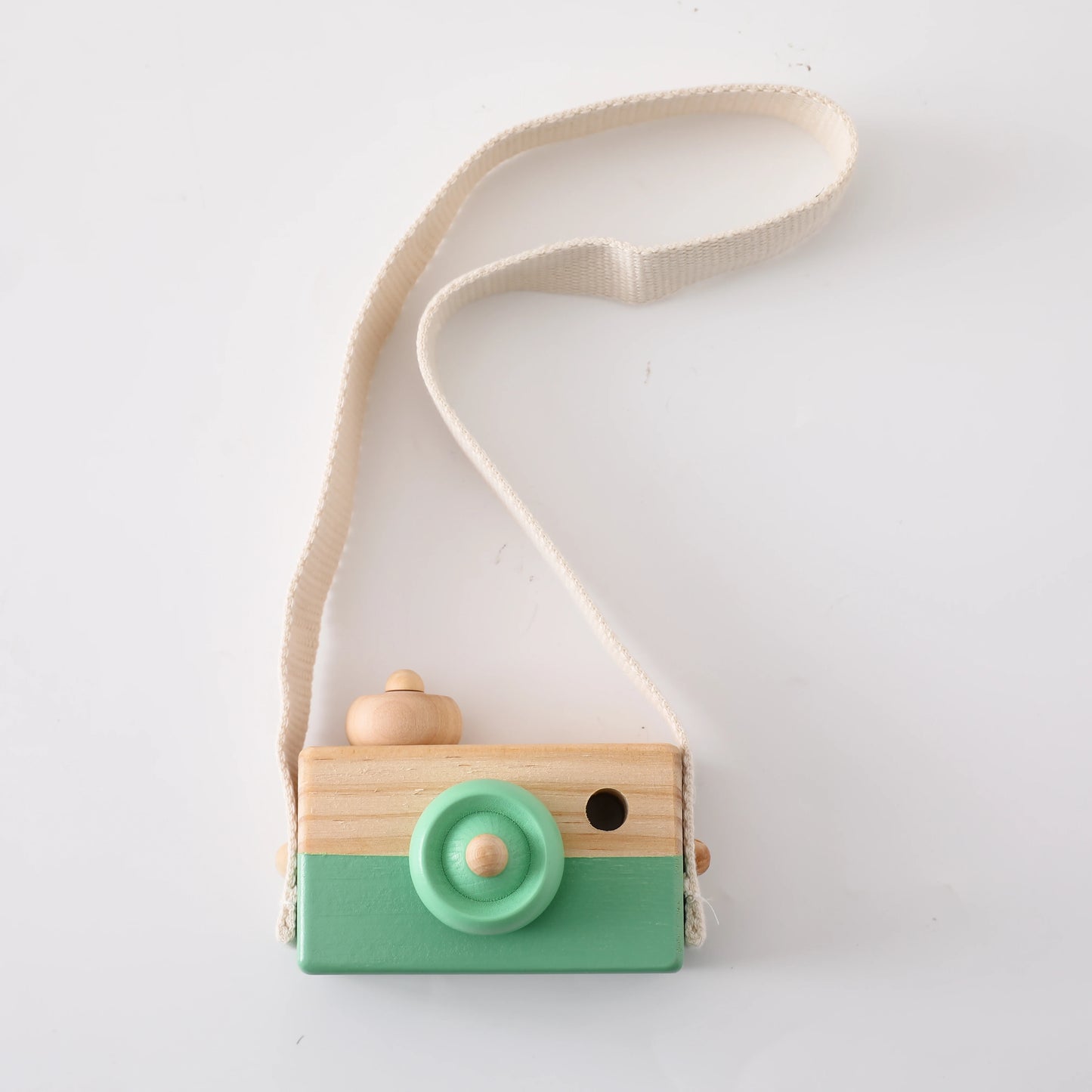 Babylove Wooden Vintage Camera in 8 colors, ideal for baby room decoration and play, designed with soft, textured surfaces for children aged 3-6 years. Unisex, CE certified, and Montessori-inspired