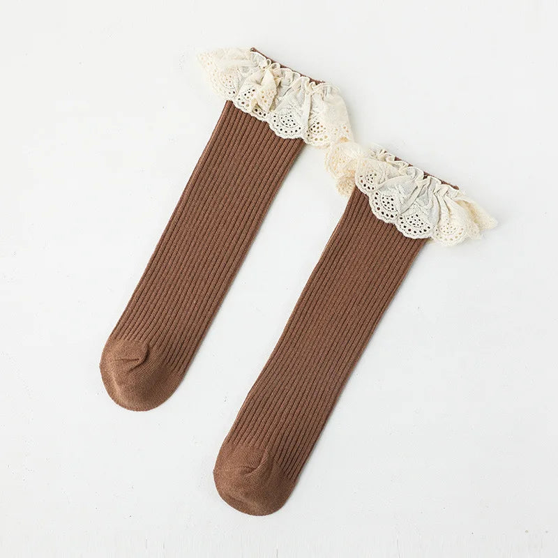 Bubebaby Babylove socks, perfect for all occasions. Made from cotton and polyester, these breathable comfortable, and skin-friendly socks are made with a solid pastoral style  featuring a ruffled frill finish