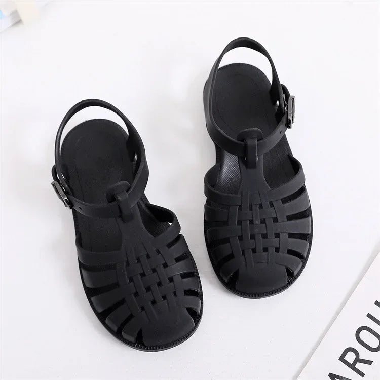 BabyLove Silicone Jelly Sandal at BubeBaby. These sandals feature a plastic outsole for durability and are designed with quick-dry, breathable, and anti-slippery features. Available in lengths of 10cm, 10.5cm, and 11cm, perfect for active little feet. Shop now for comfort and style