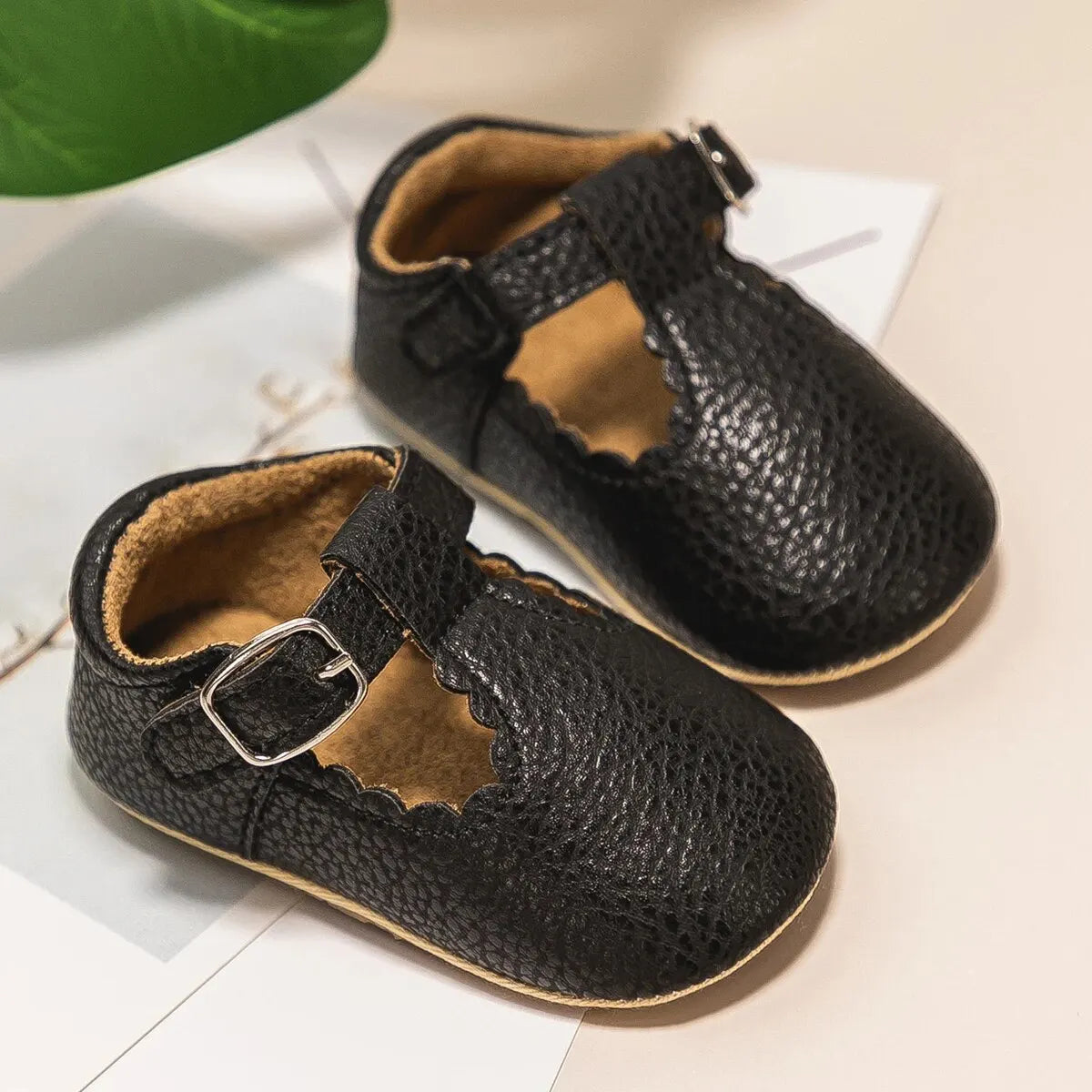 Bubebaby BabyLove faux leather dress shoes in a classic look. The shoes feature a sleek, polished design perfect for special occasions or formal wear. With a soft, cushioned interior for comfort