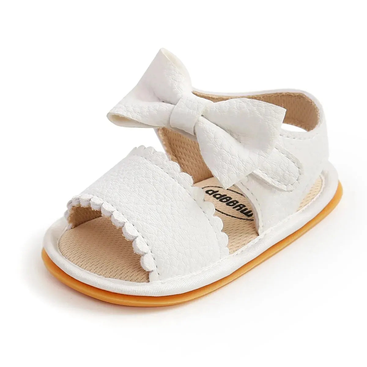 A cute pair of Bubebaby BabyLove  faux leather sandals for infants featuring an adorable bow detail. The sandals are designed for comfort and style, perfect for little ones to wear during warm weather. The adjustable strap ensures a secure fit while the soft sole provides cushioning for tiny feet