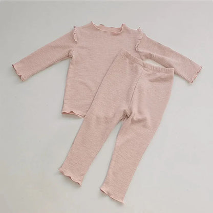 Shop the Babylove Spring Sleepwear Set at BubeBaby, featuring cozy cotton pajamas perfect for spring and autumn. Available for ages 7-12 months to 4-6 years, this unisex set includes a round-neck top and pants with a casual, printed design. Fits true to size with full sleeves and broadcloth fabric. Ideal for comfortable, stylish sleepwear
