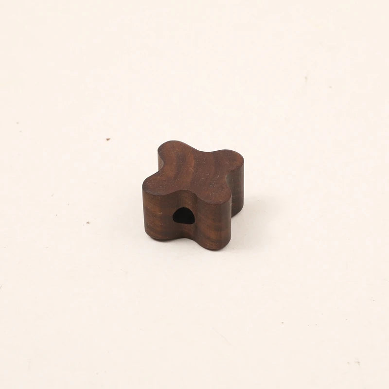 Walnut cross shape with a threading hole