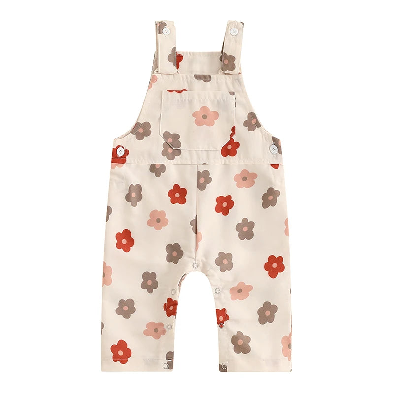Bubebaby BabyLove Floral Jumpsuit Dungaree Romper. The romper features a floral pattern with a mix of vibrant colors. Featuring a pocket on the chest with shoulder straps, and snap closures at the bottom for easy diaper changes.
