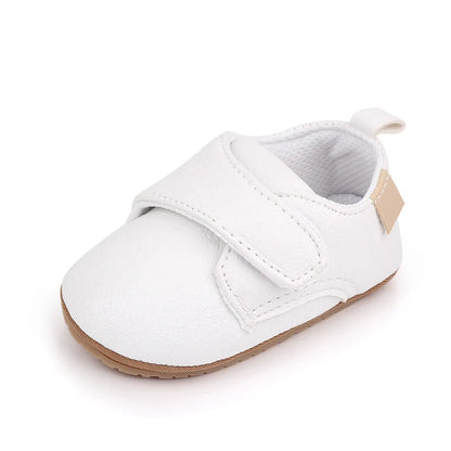 Bubebaby BabyLove faux leather dress shoes in a classic look. The shoes feature a sleek, polished design perfect for special occasions or formal wear. With a soft, cushioned interior for comfort
