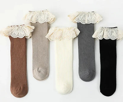Bubebaby Babylove socks, perfect for all occasions. Made from cotton and polyester, these breathable comfortable, and skin-friendly socks are made with a solid pastoral style  featuring a ruffled frill finish